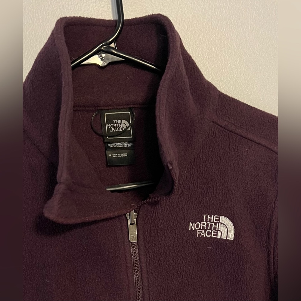 Purple fleece north face jacket, size medium. Used but in good shape!
